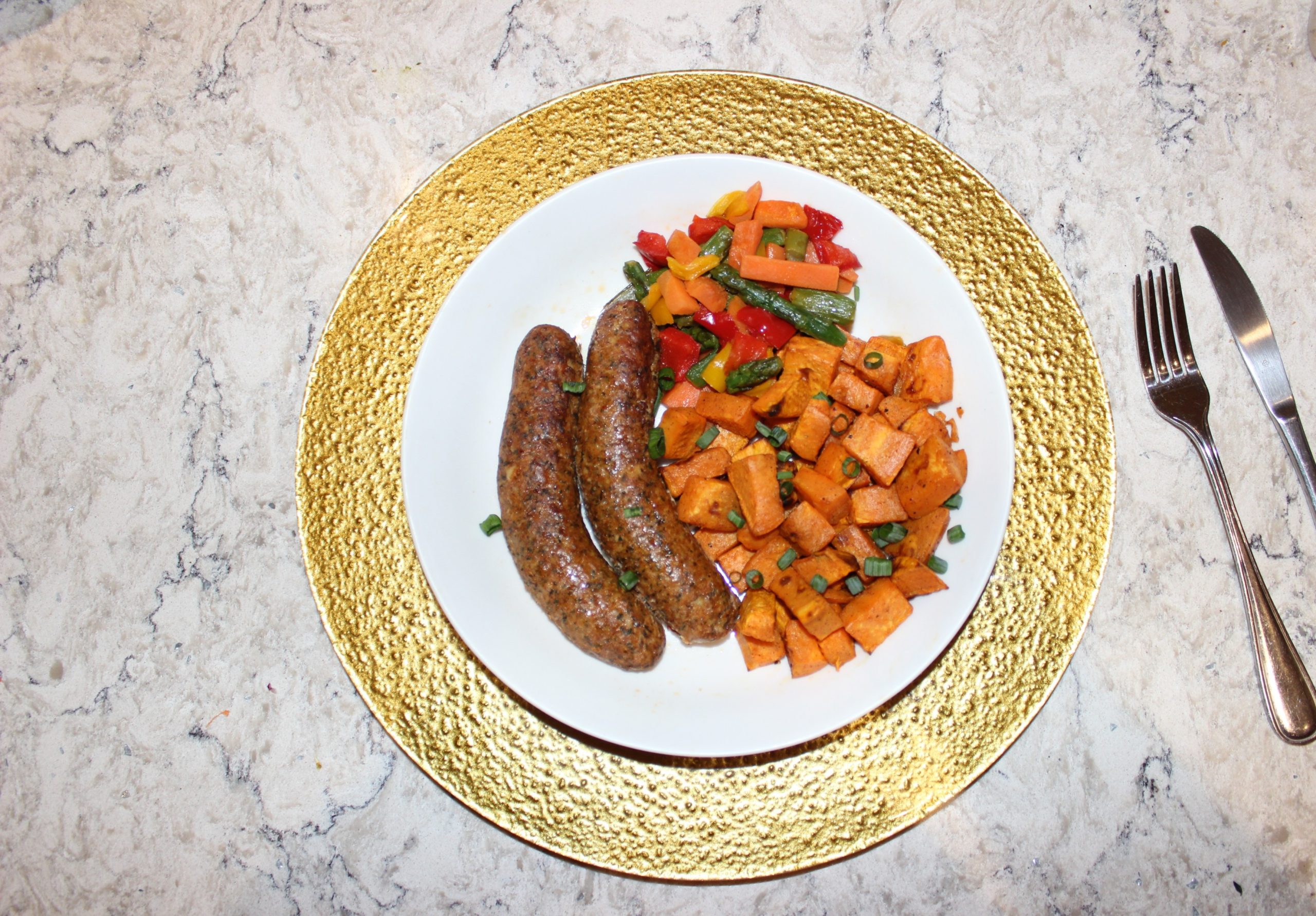 Jerk chicken sausages w/ sweet potatoes & broccoli