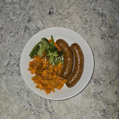 Jerk chicken sausages with sweet potatoes